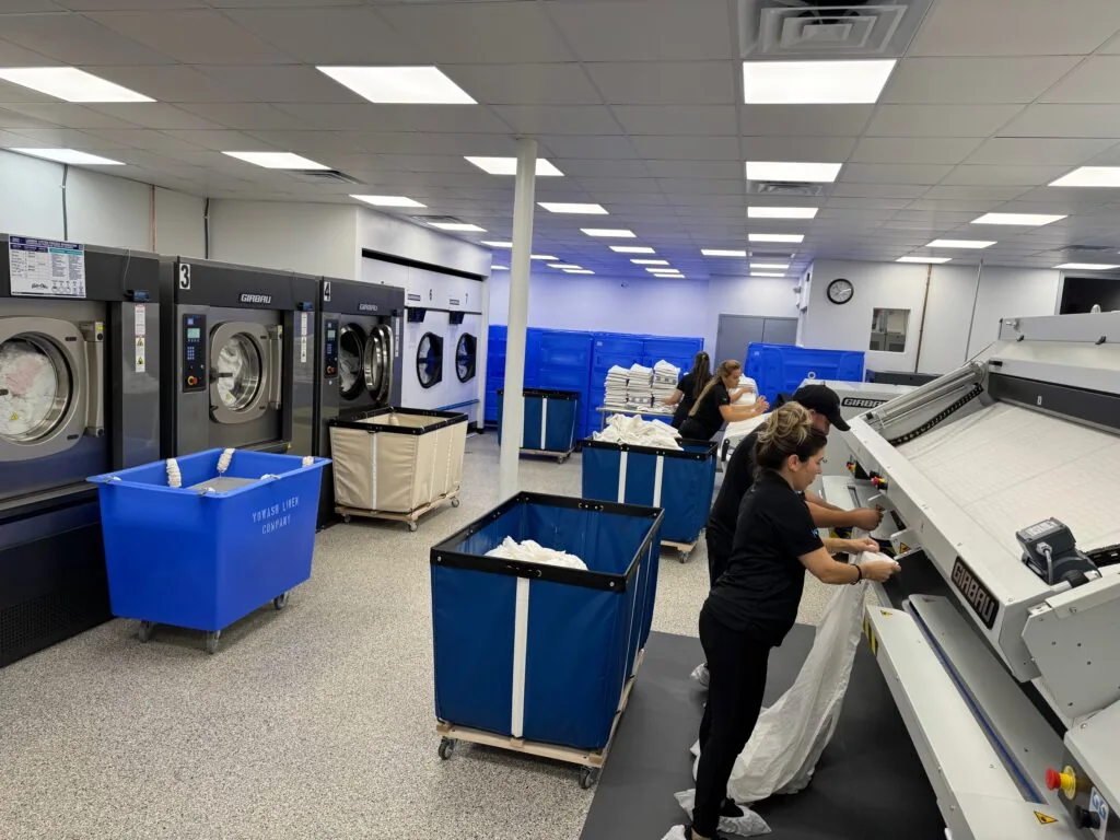 The YoWash Linen team at work in the Sarasota facility